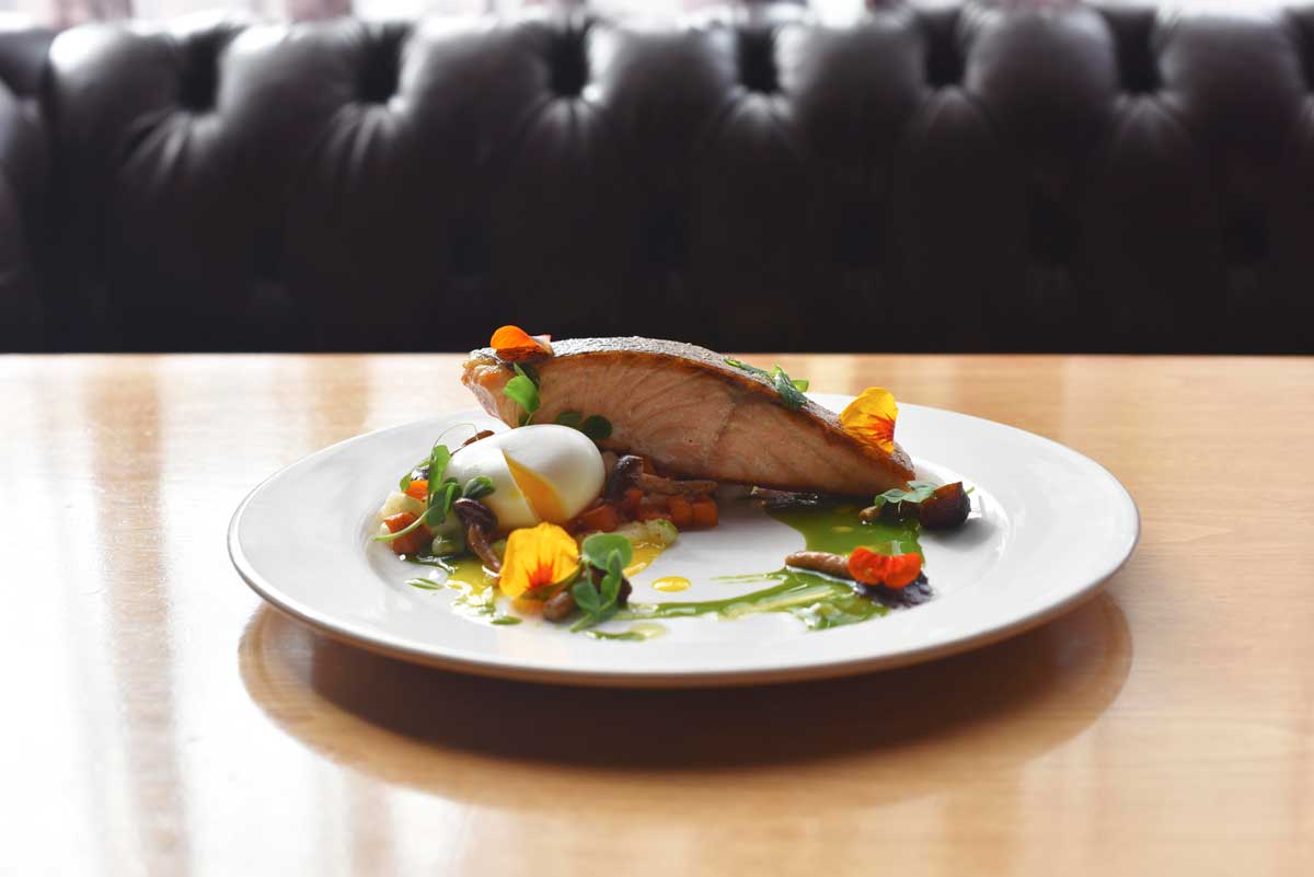 The comfortable plush seating at 1300 Fillmore complements the rich menu. 