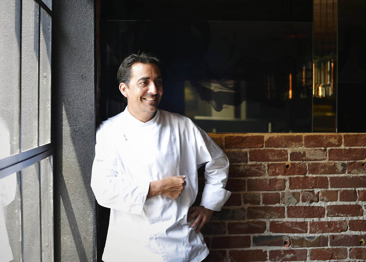 Executive Chef and Partner of Twenty Five Lusk, Matthew Dolan, laughs during a photo shoot in the upstairs area of his first restaurant 