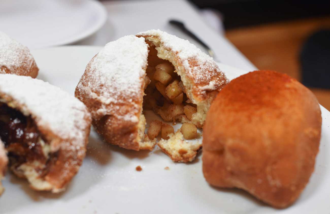 The Beignet Flight comes with four different kinds of stuffed and plain beignets