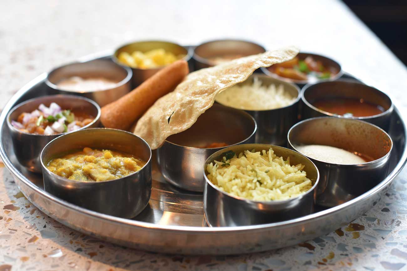 Small plates and appetizers with sauces and sides are popular for large and small groups at Dosa 