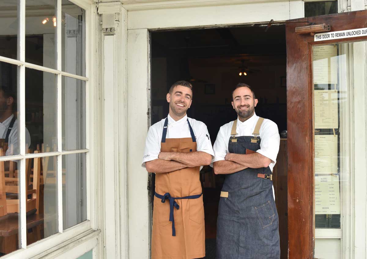 Chefs Jonathan Sutton and Tony Ferrari at the entrance to Hillside Supper Club