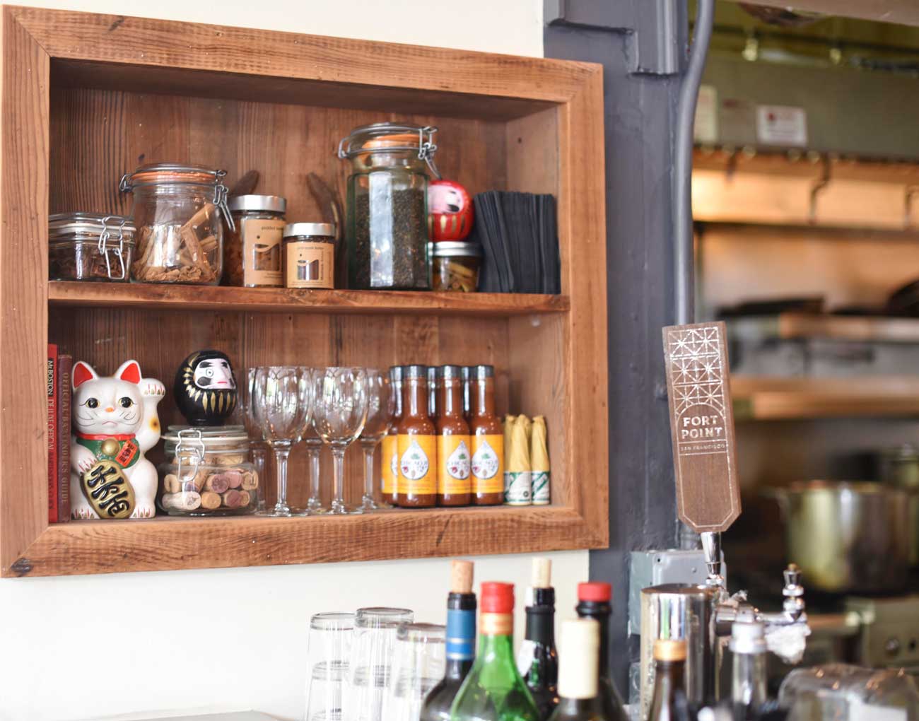 Knick-knacks, gifts from Bernal Heights neighbors and patrons, adorn the shelves at Hillside Supper Club.
