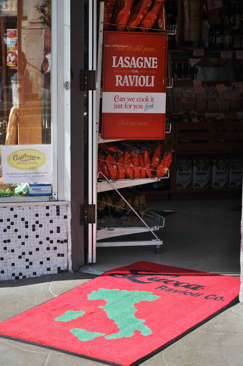 A bright red mat welcomes you into Lucca Ravioli