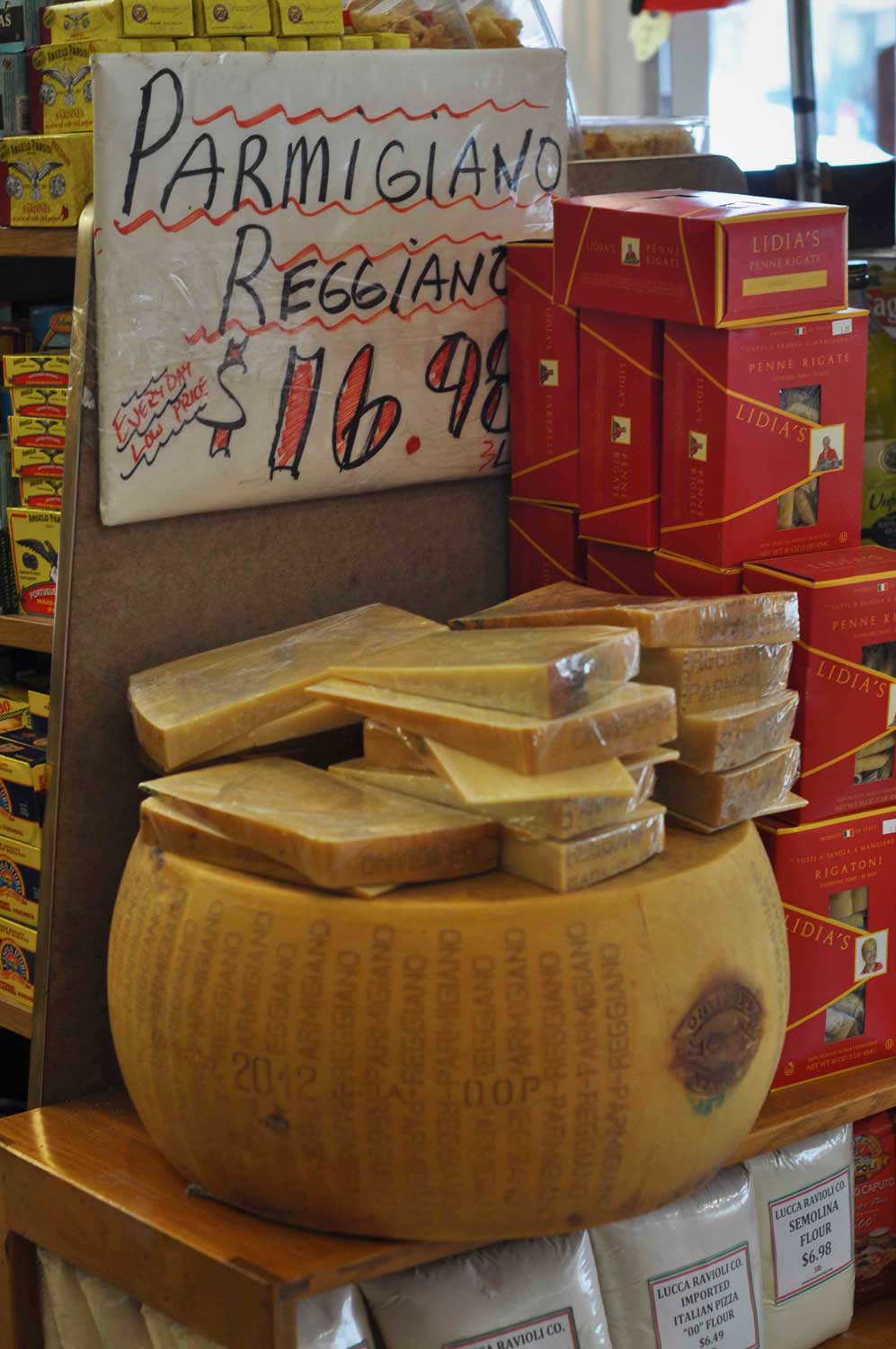 Giant wheel of parmesan cheese — parmigiano reggiano