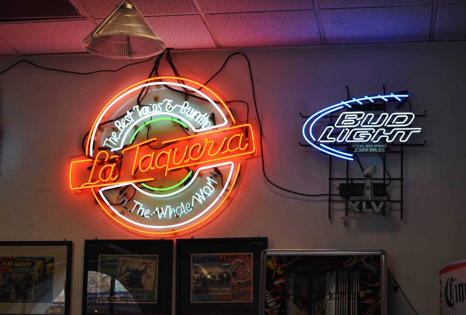 Neon lights illuminate La Taqueria