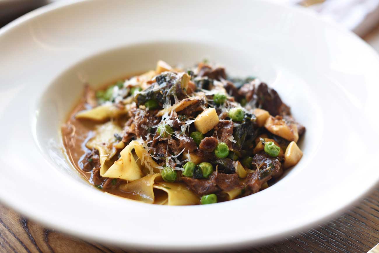 Pappardelle with pork cheeks, peas, kale, brown beech mushrooms, tarragon ($22) 