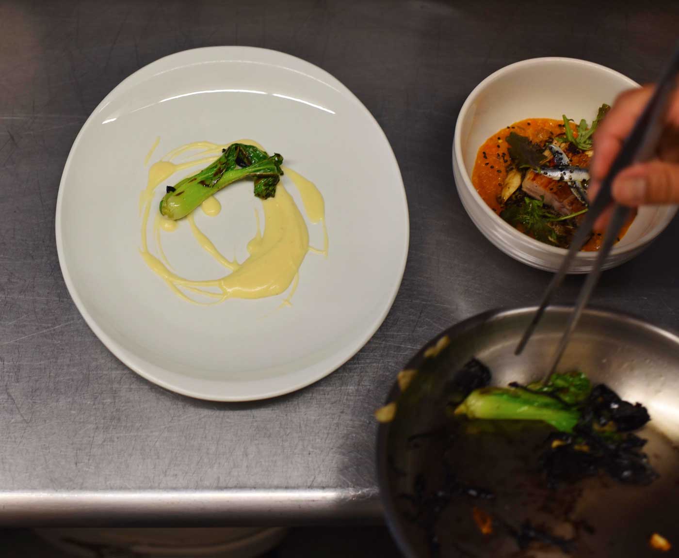 Prepping the plate with fresh California inspired ingredients.