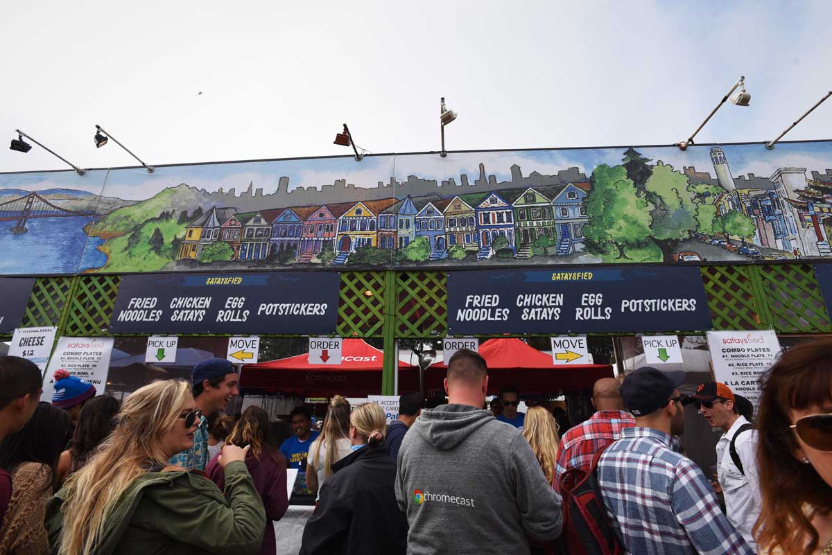 Long lines form in front of Sataysfied, a food cart just at the main stage at Outside Lands.