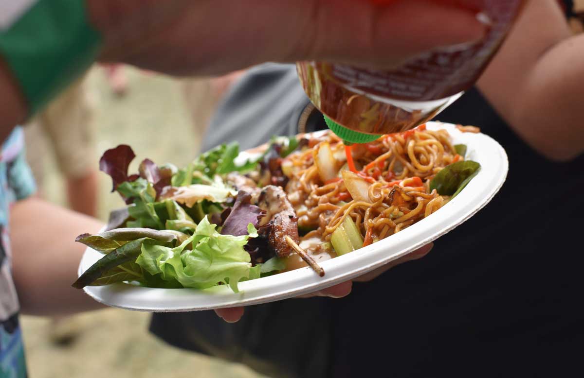 Sriracha is a favorite topping for Sataysfied's savory noodle dish.