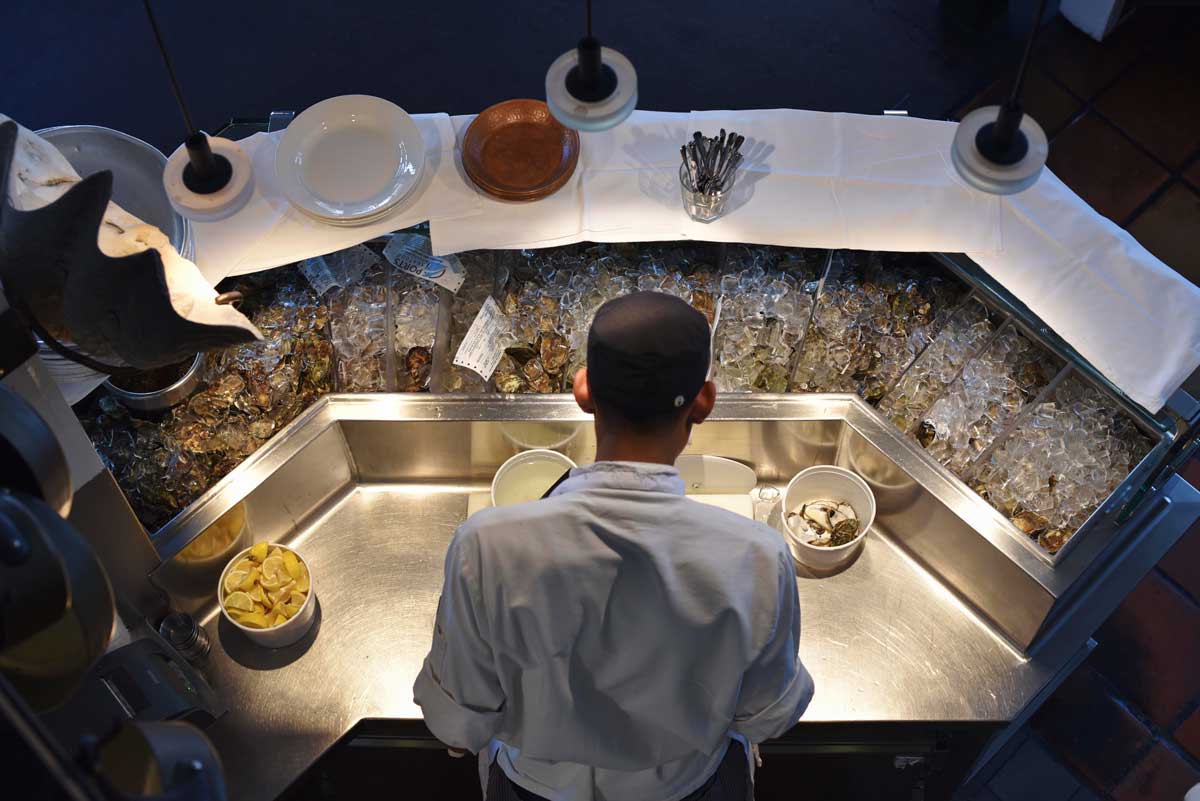 The oyster station at Zuni, in the spotlight.