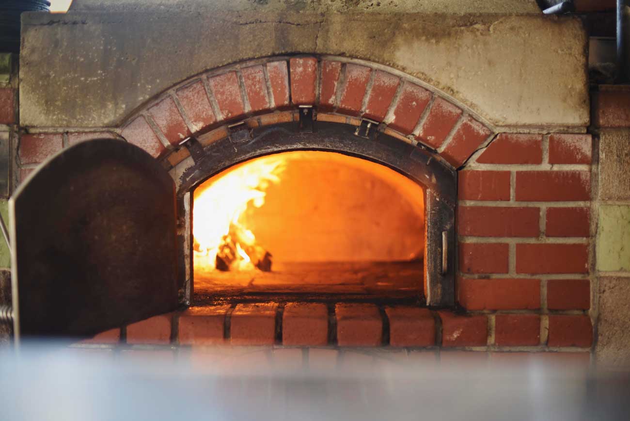 The wood burning oven in Zuni sits in the center of the restaurant, surrounded by diners who happily wait the 45 minutes for the roasted chicken.