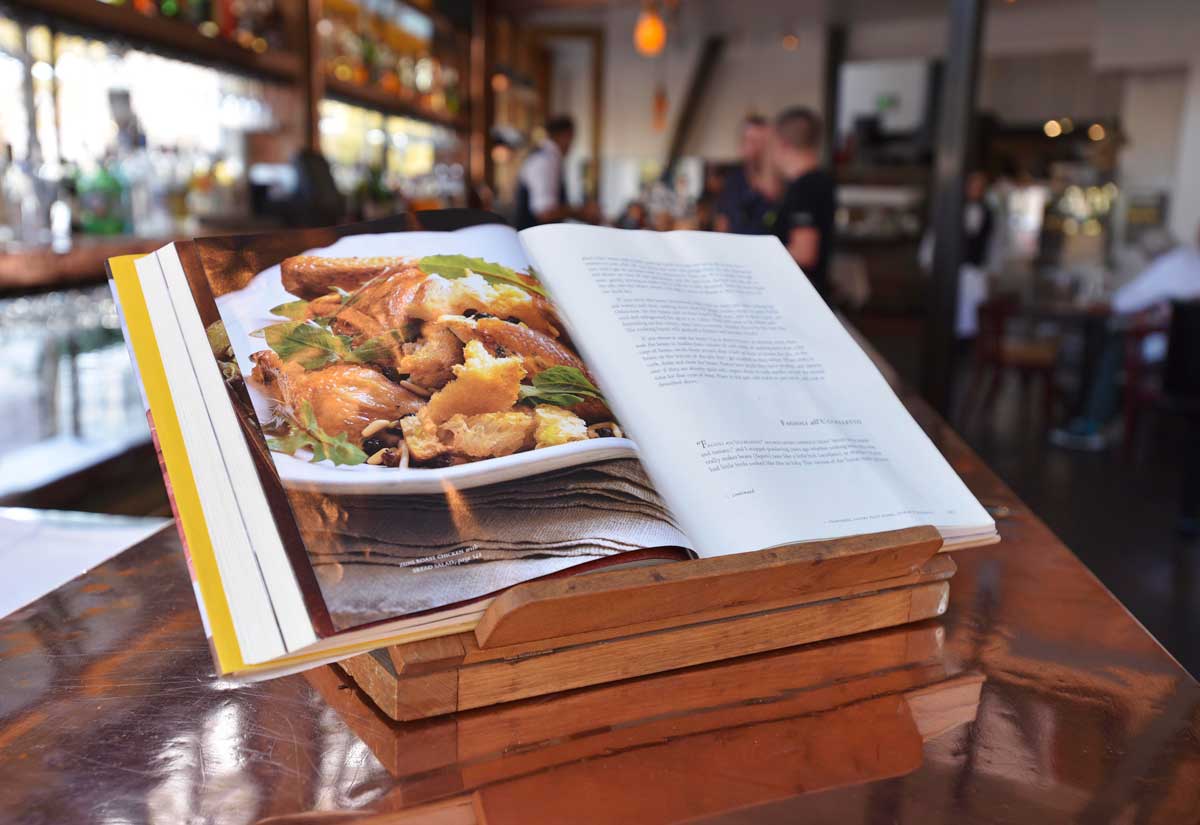 The popular Zuni Café cookbook, on display at the restaurant's piano bar.