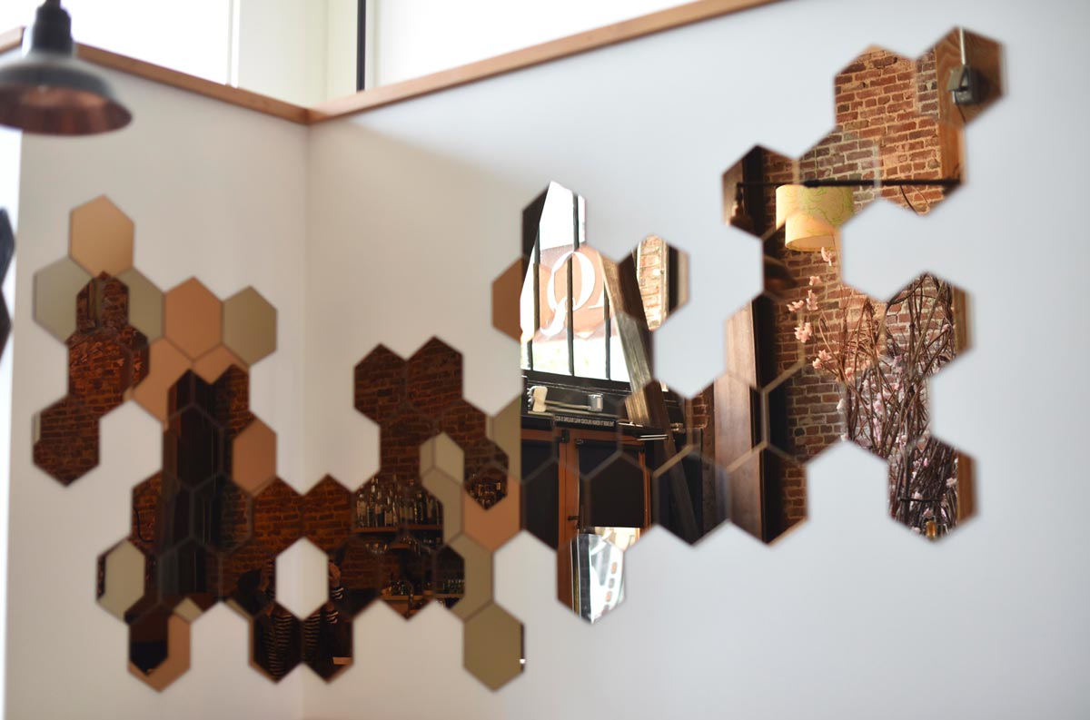 Honeycomb style mirrors show the AQ reflection 