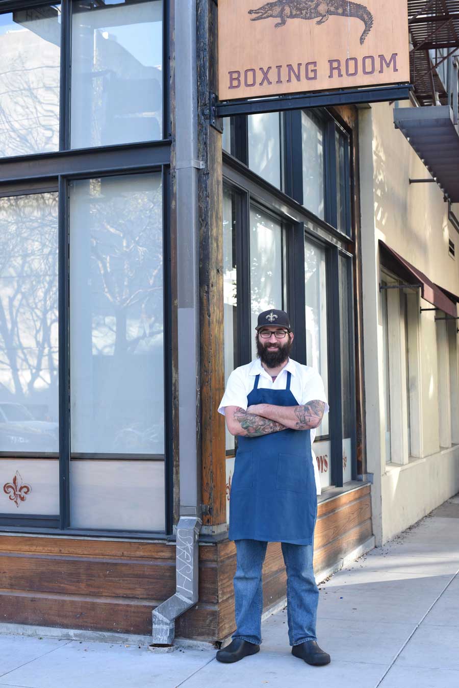 Executive Chef Justin Simoneaux stands on Grove Street, outside of his Hayes Valley restaurant, Boxing Room