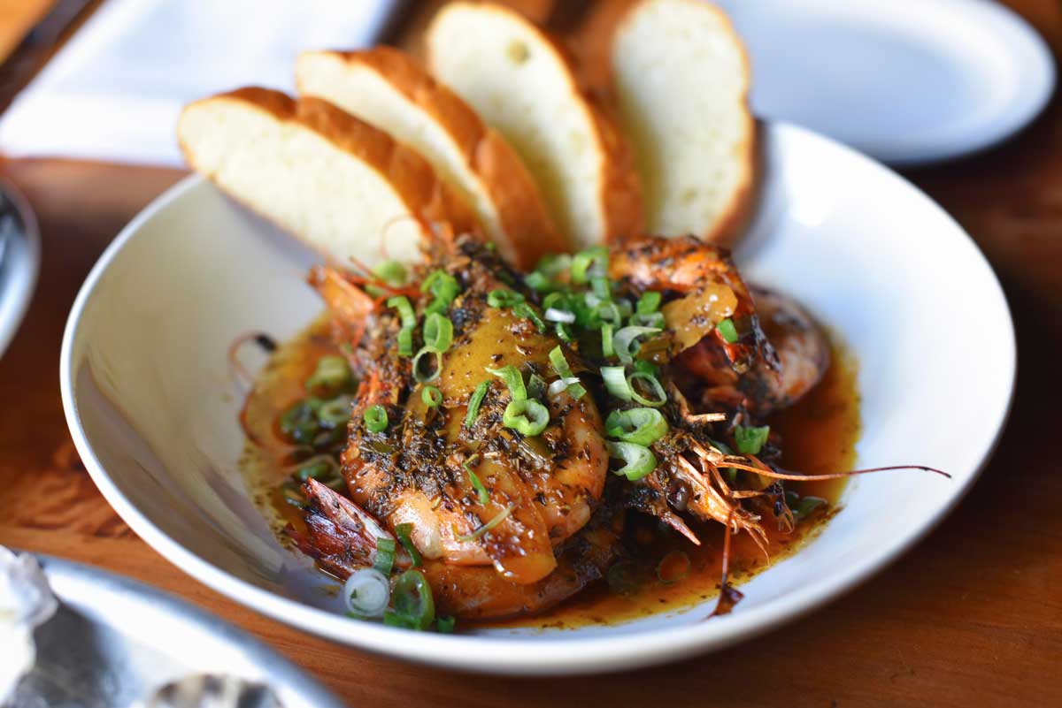 Boxing Room's take on New Orleans barbecue shrimp with bread and sauce