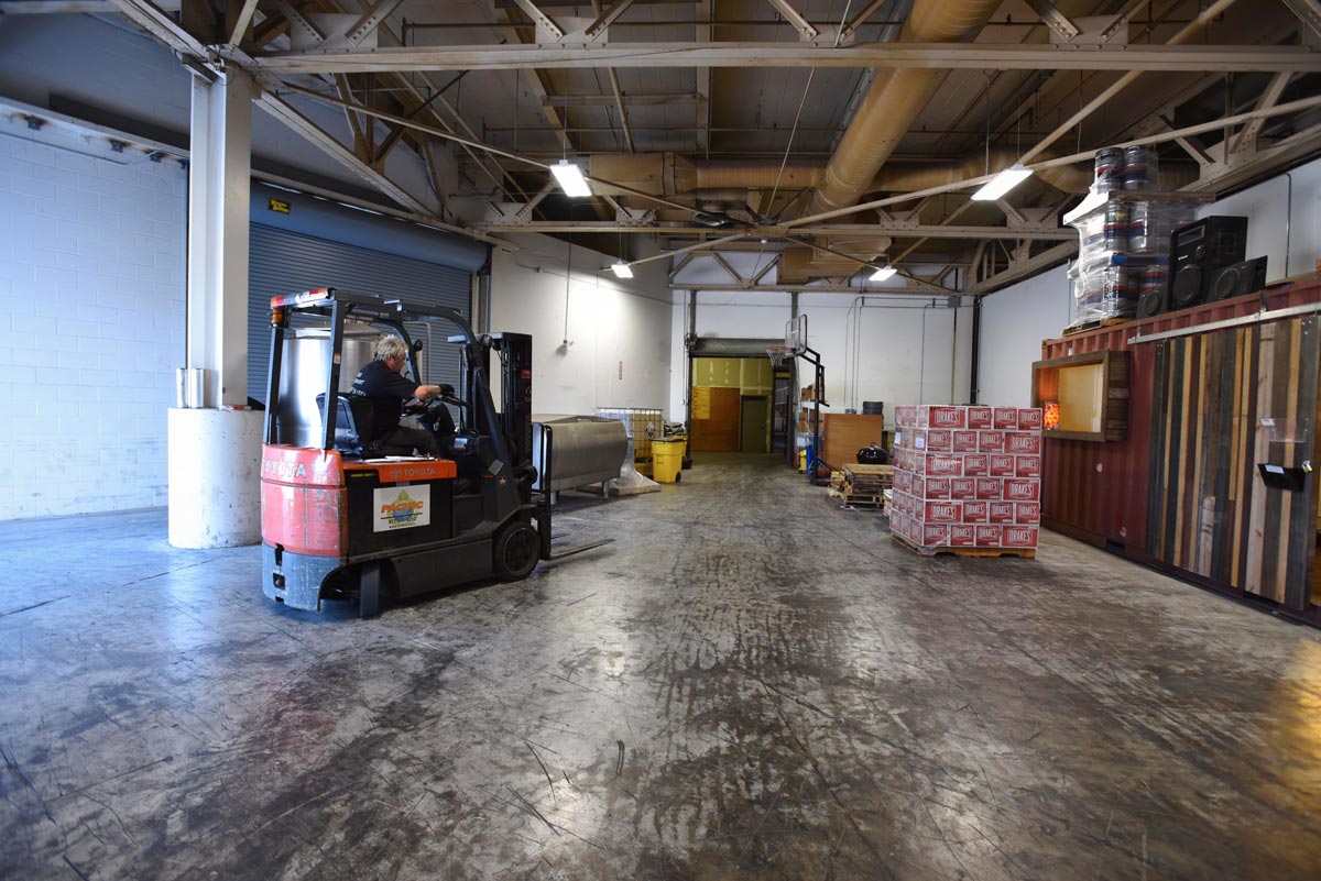 The manufacturing process takes place in a large warehouse in San Leandro 