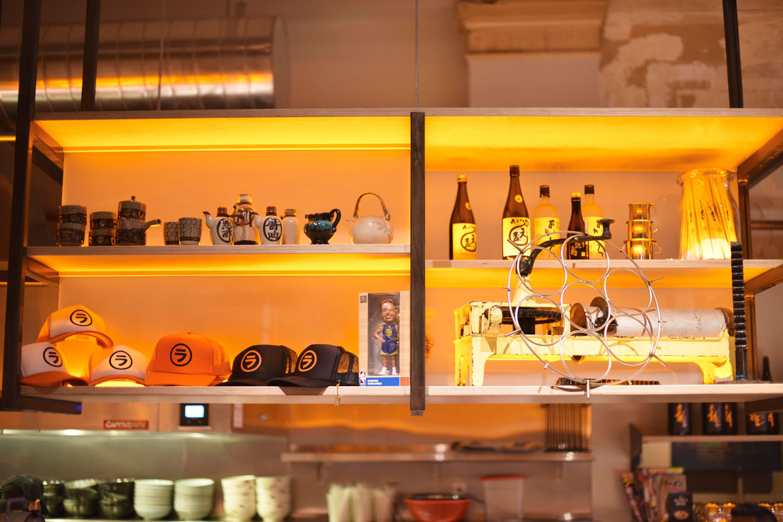 The Itani Ramen decor includes tchotchkes from Oakland, Japanese, and Japanese-American traditions