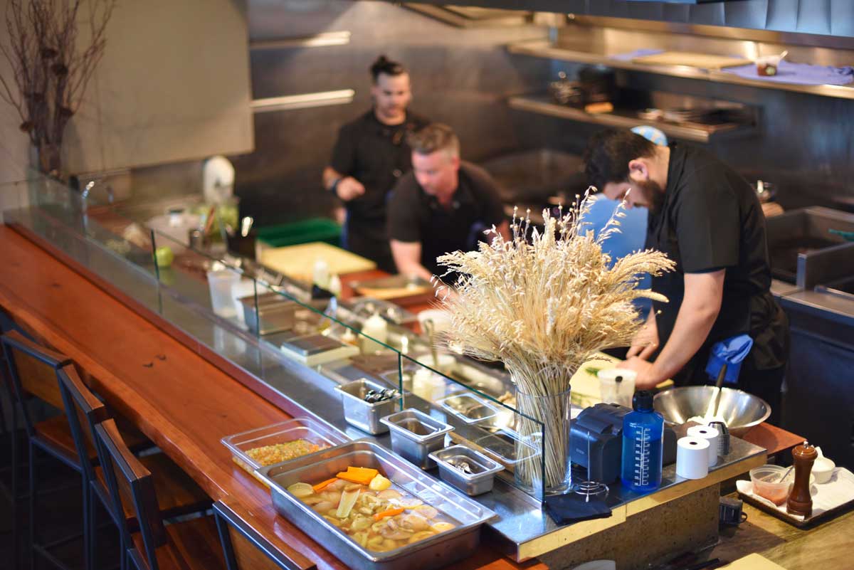 The kitchen staff at Maven operates like an upscale restaurant with hustle  