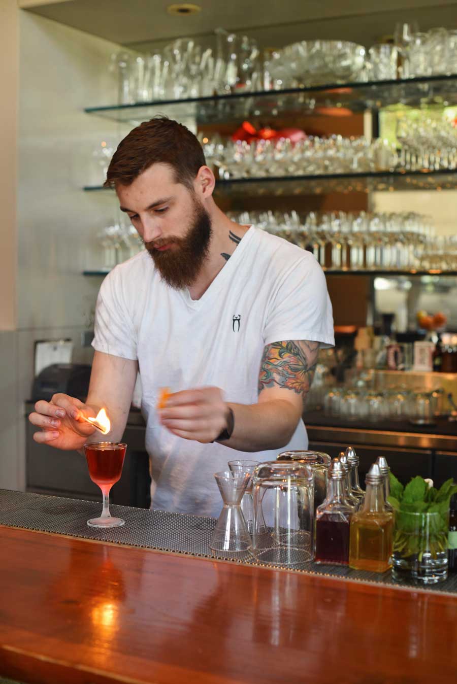 A cocktail drink created with fire, named 'The Wiggle' after the bike path near the restaurant  