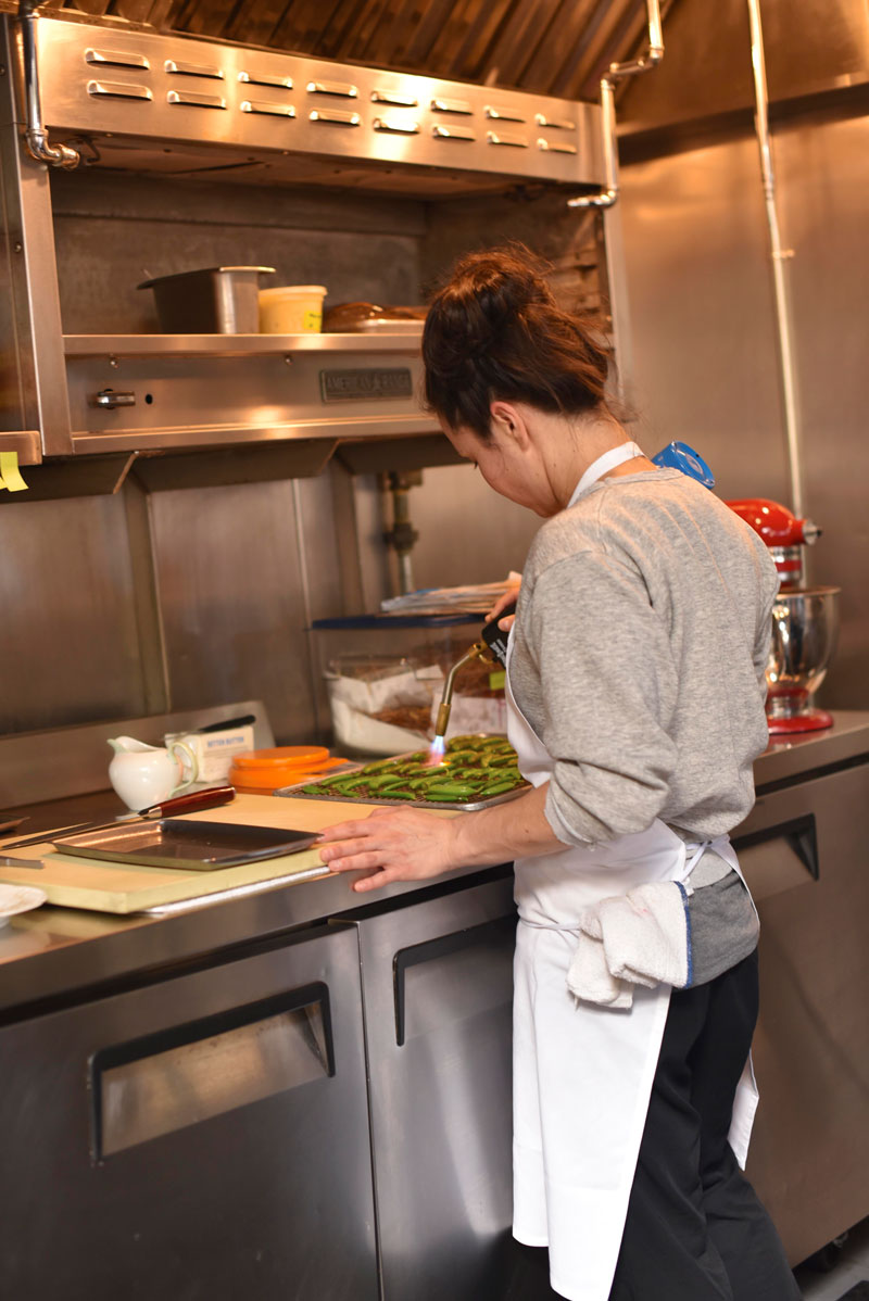 The pastry and vegetable station stays by the bar - greens are flame-cooked.