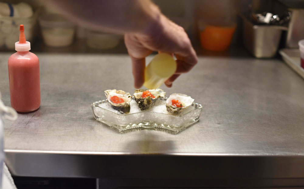 Oysters are served with a refreshing strawberry chutney
