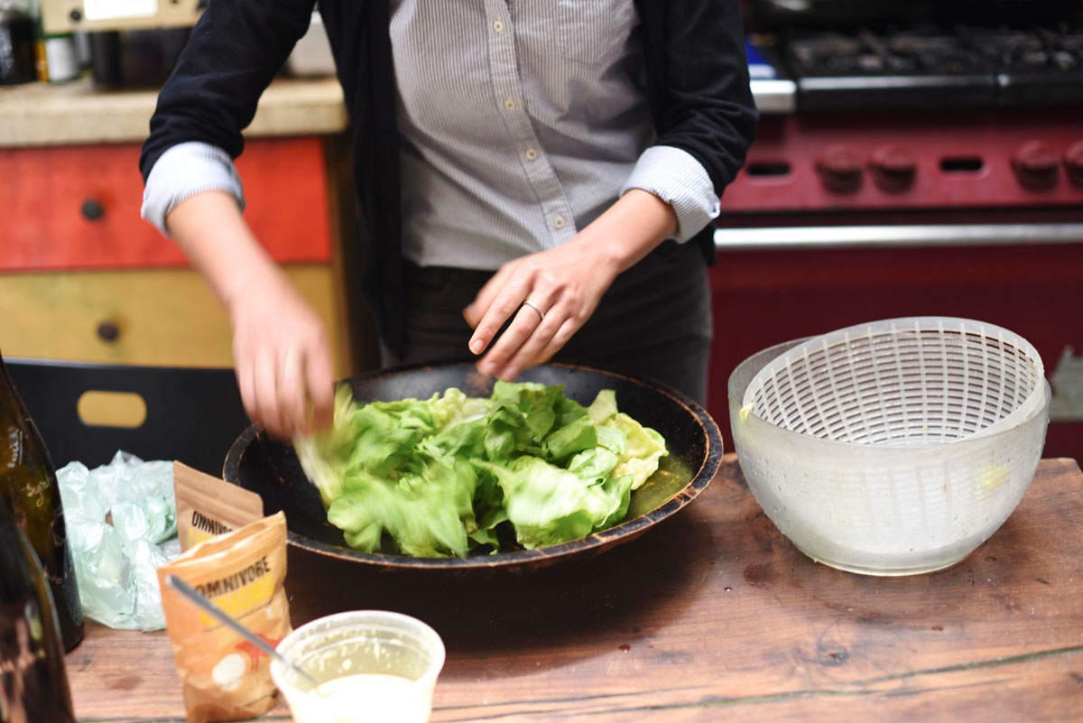 Omnivore's Veronica Ronchi prepares the salad