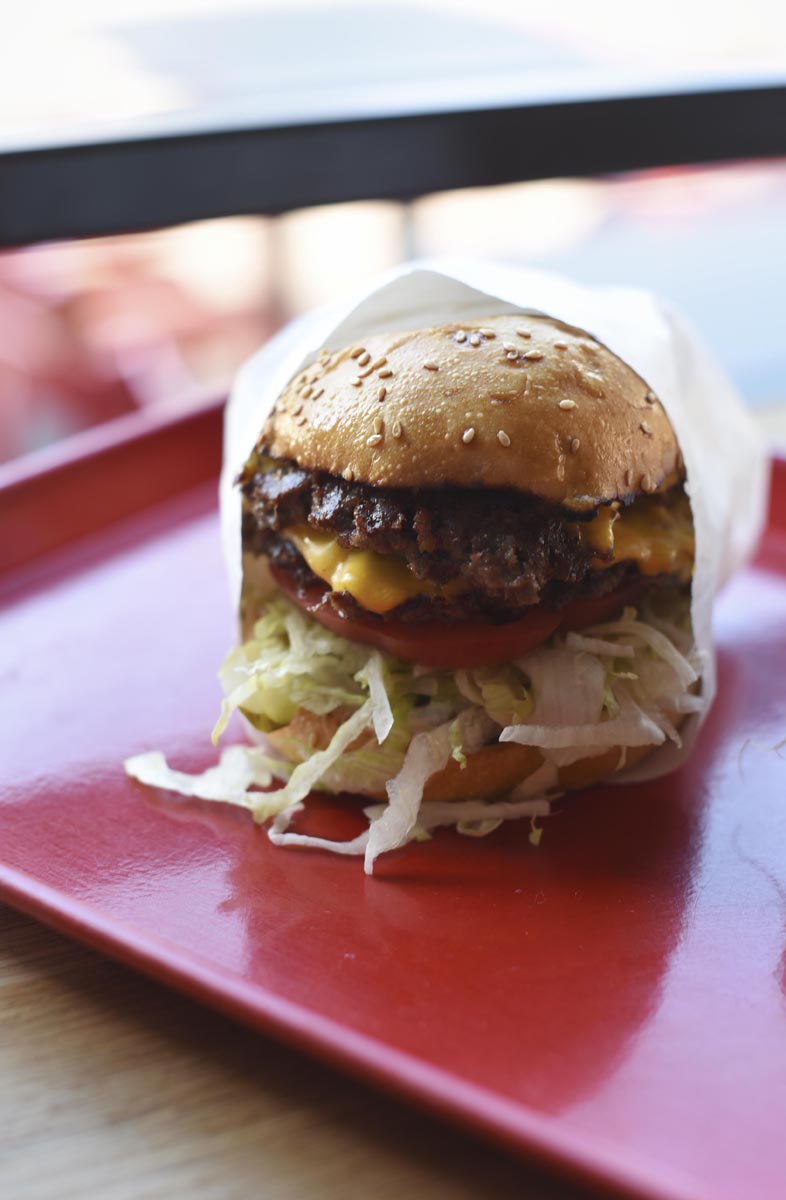 The classic smash burger at Popson’s is modeled off its famous Causwells predecessor  