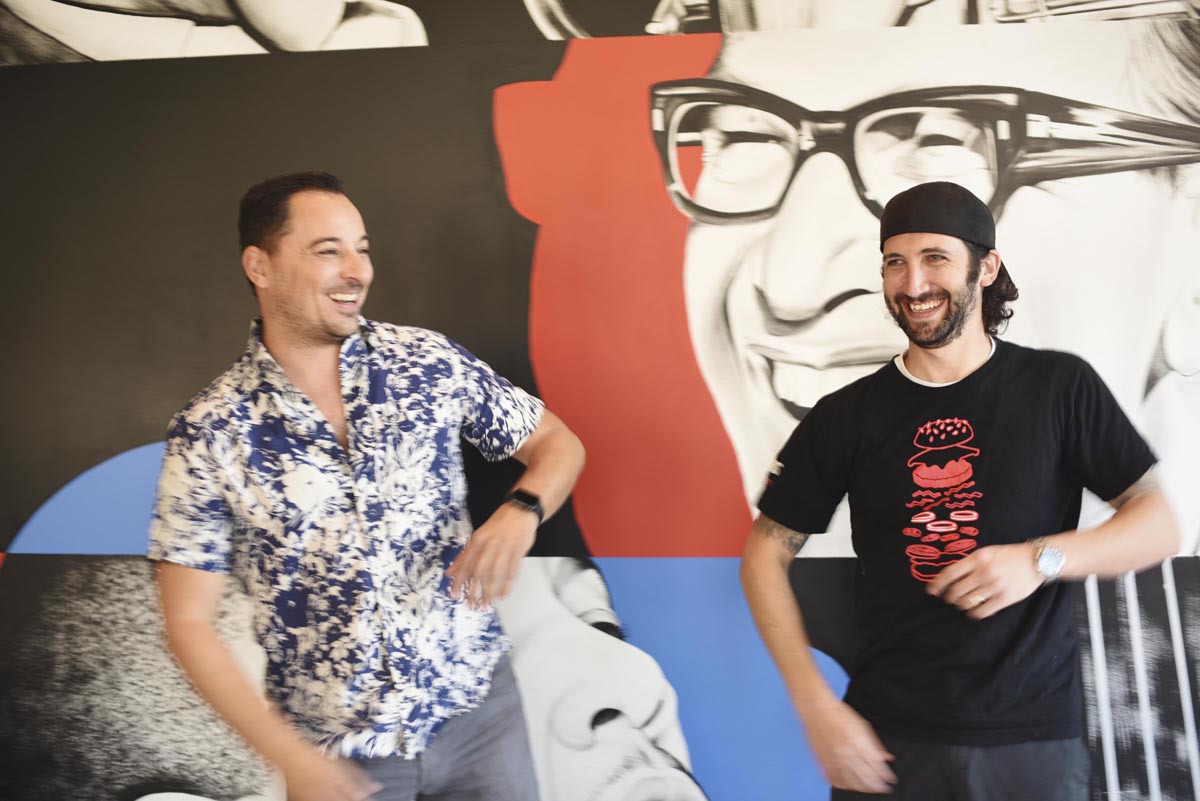 Alvin Garcia and chef Adam
				 Rosenblum of Popson’s goof off during a photo shoot  