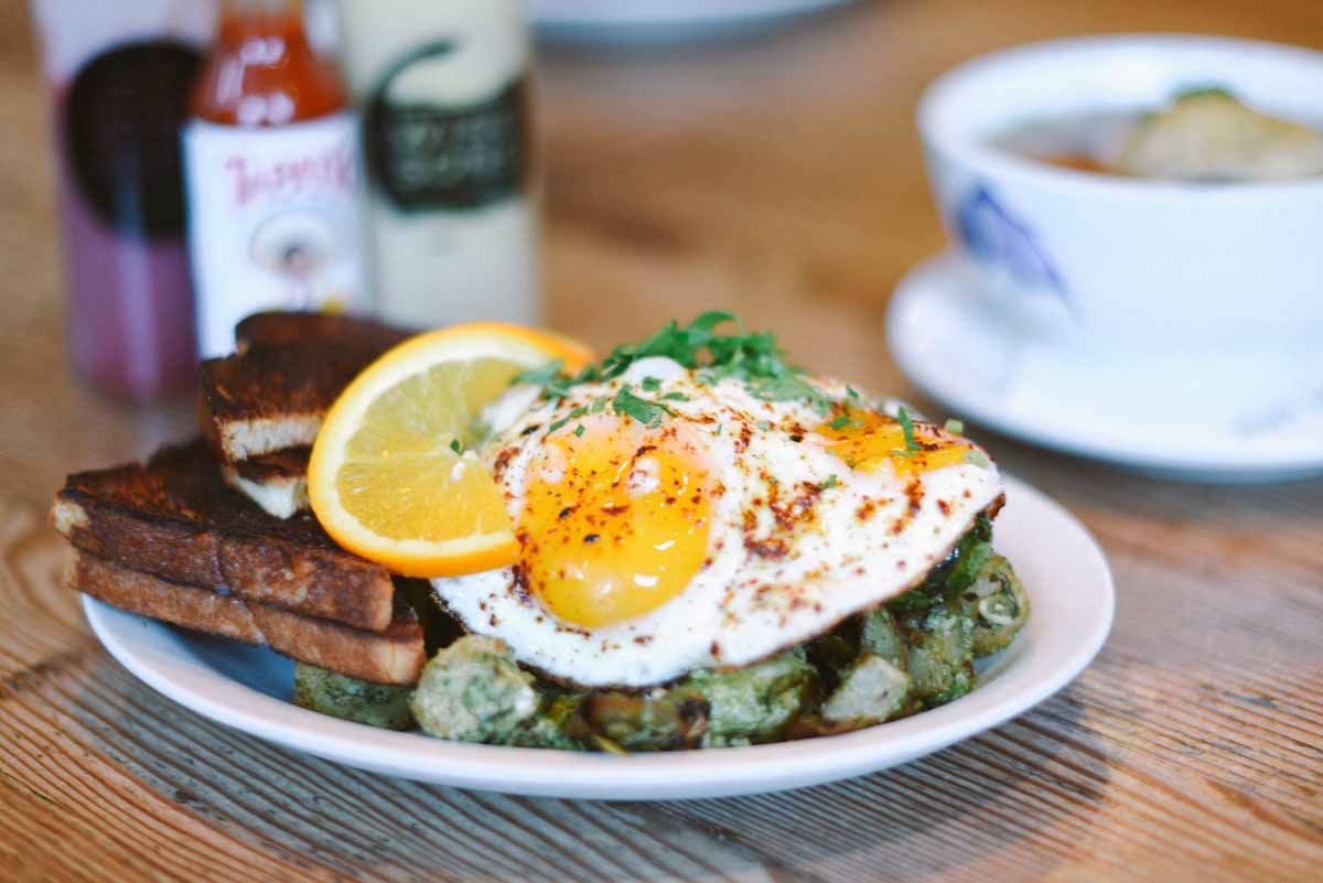 Brussel sprouts topped with fried eggs at Wise Sons  