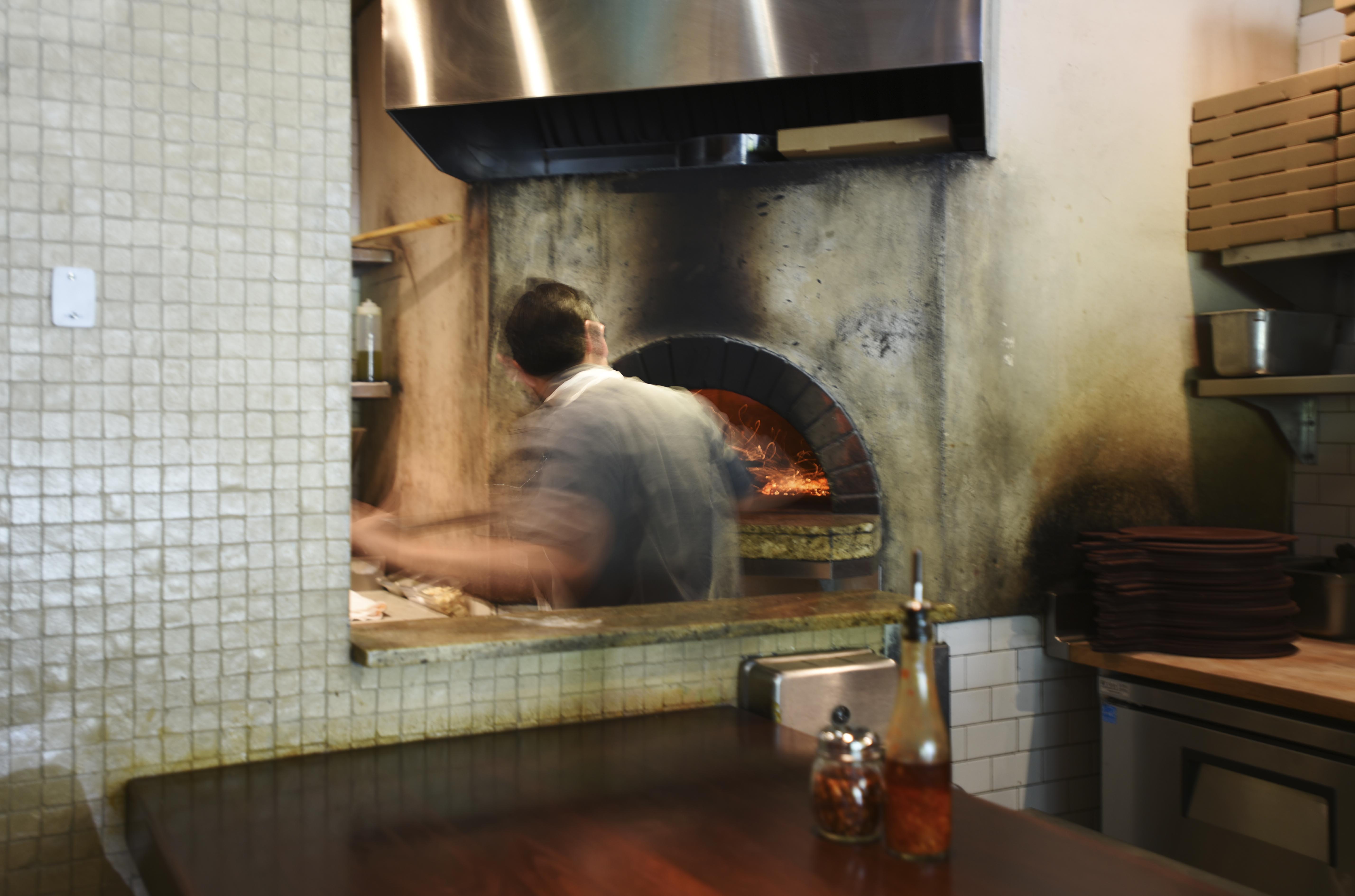 The wood burning oven at Picco was imported from Italy