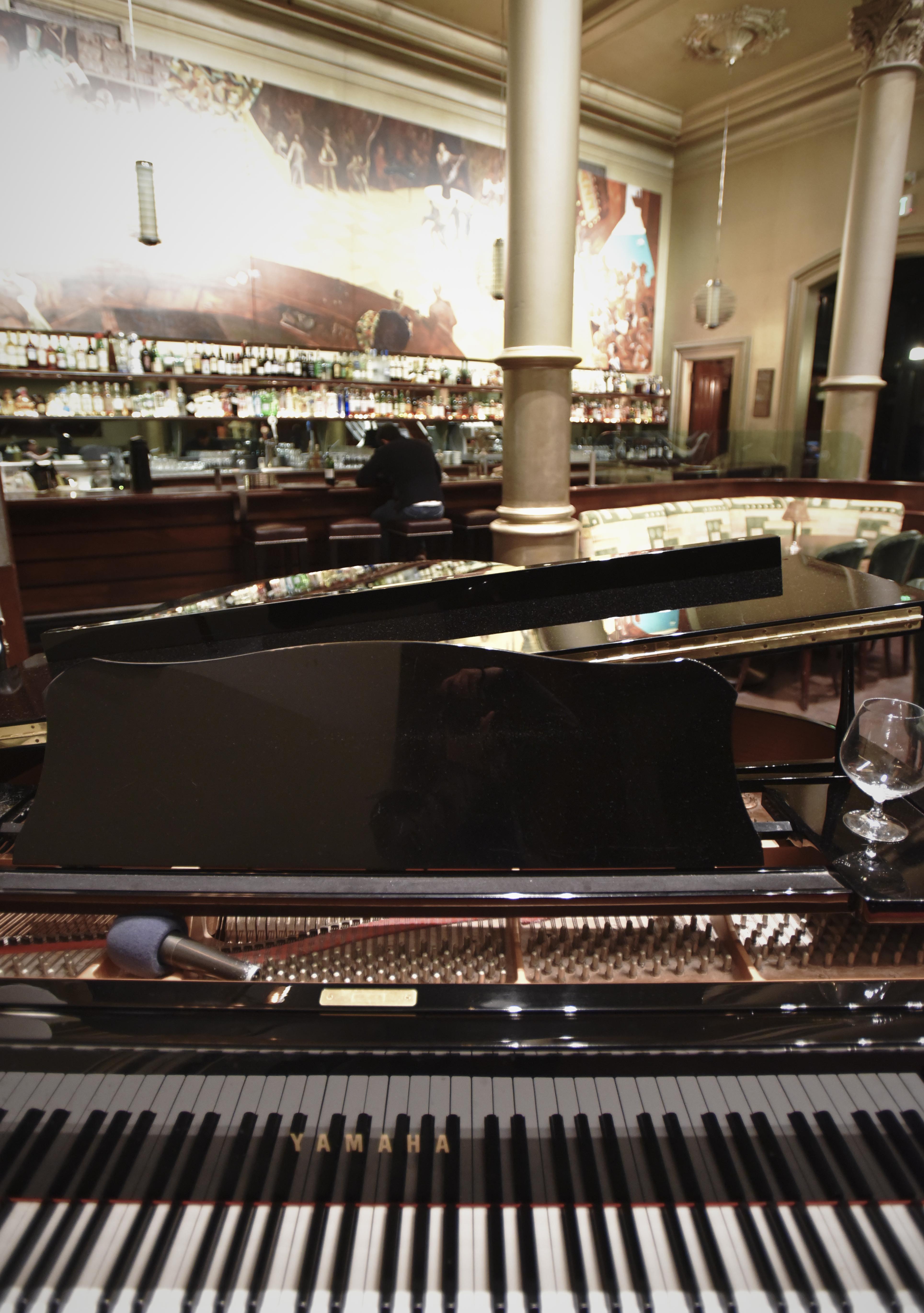 A grand piano adorns the Bix interior